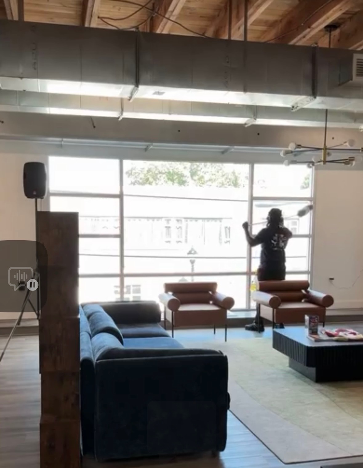 Next Level Commercial Cleaning professional cleaning windows in a modern DC office